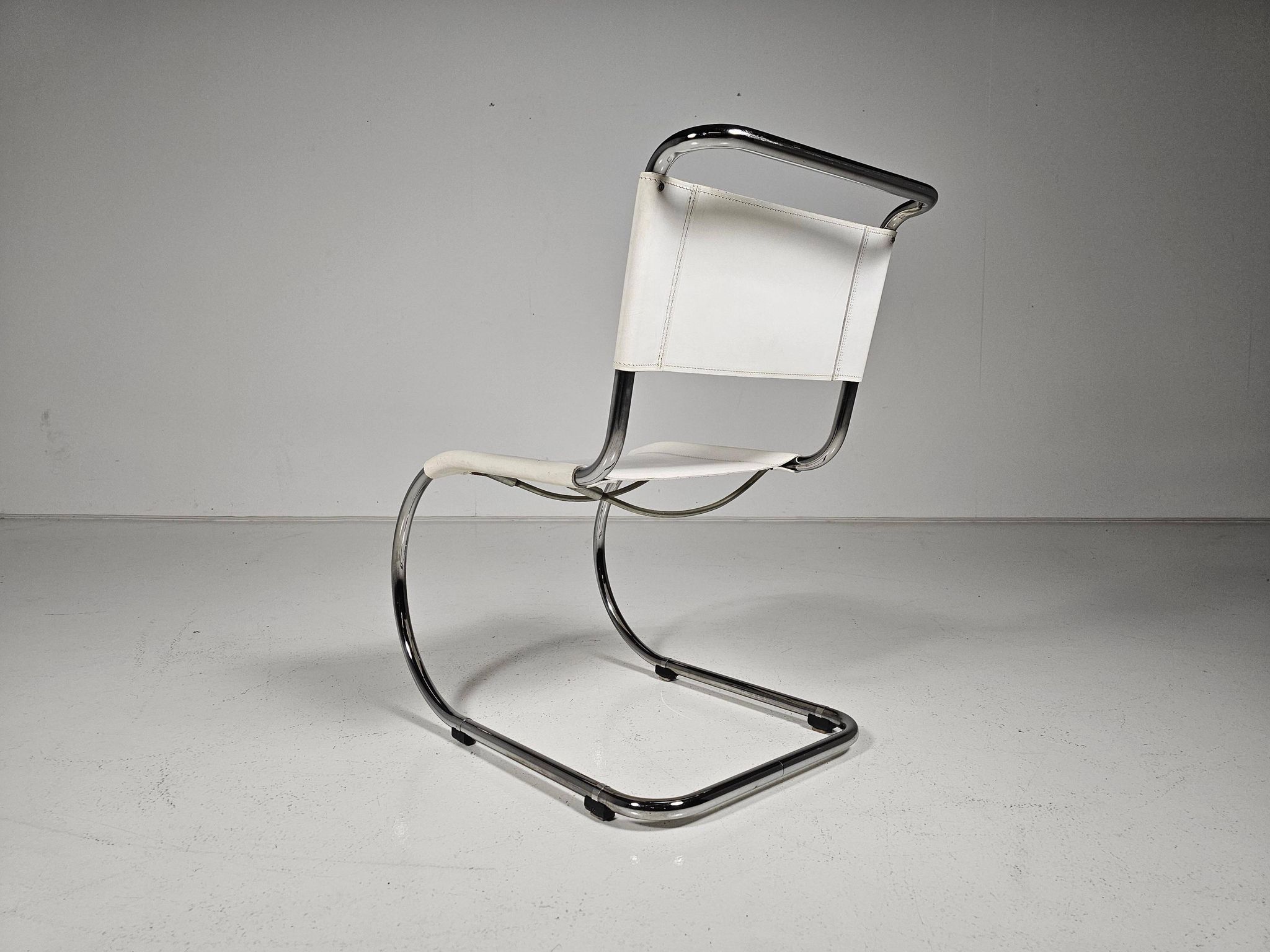 Set of 6 white cantilever dining chairs MR10 by Mies van der Rohe for Thonet, 1980s.