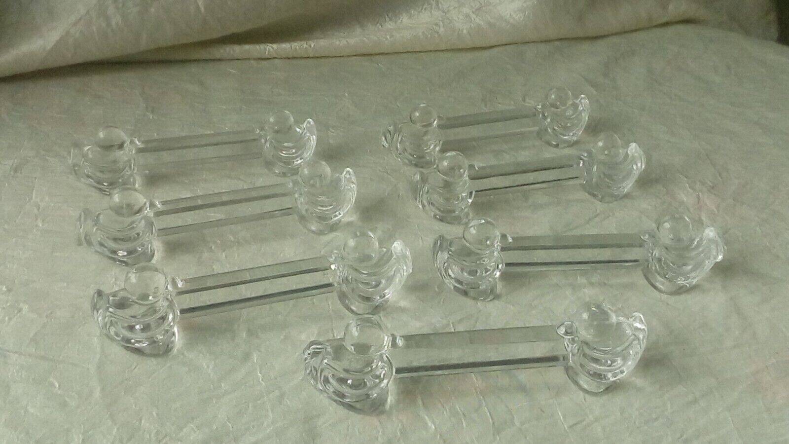 Suite of 7 yer glass knife holders deposited little duck