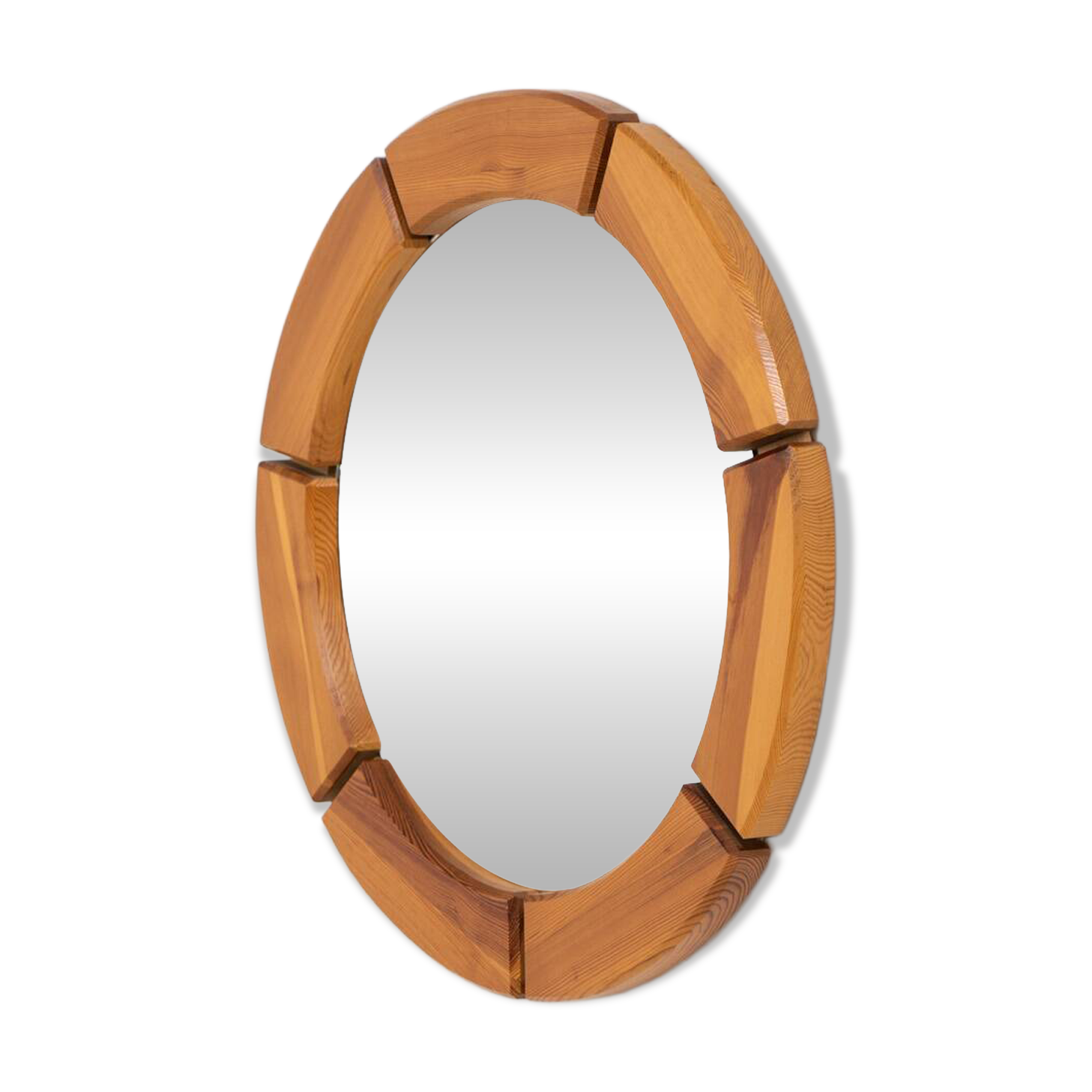 Sculptural wall mirror in solid pine