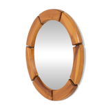Sculptural wall mirror in solid pine