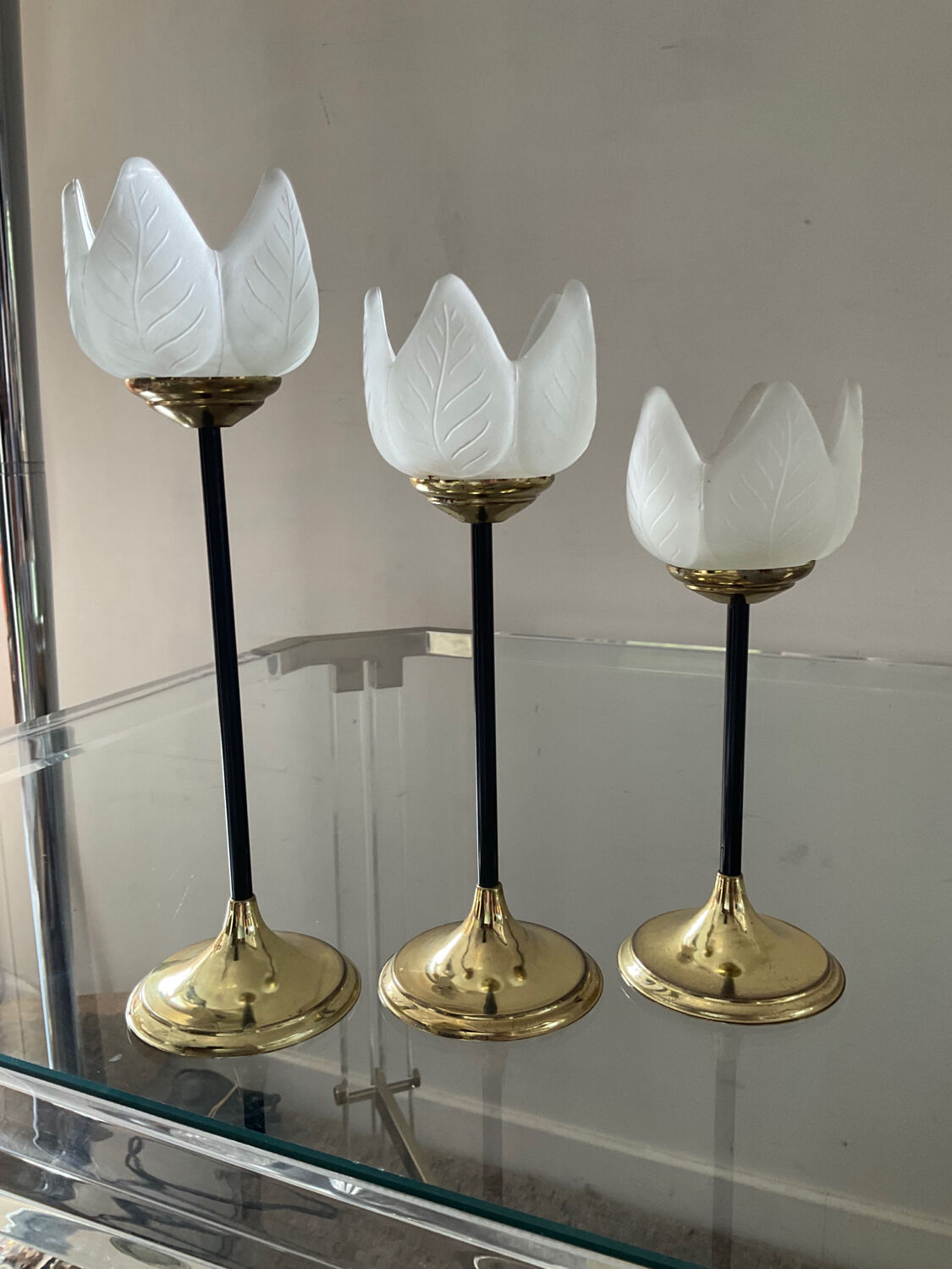 Trio of glass and metal candle holders