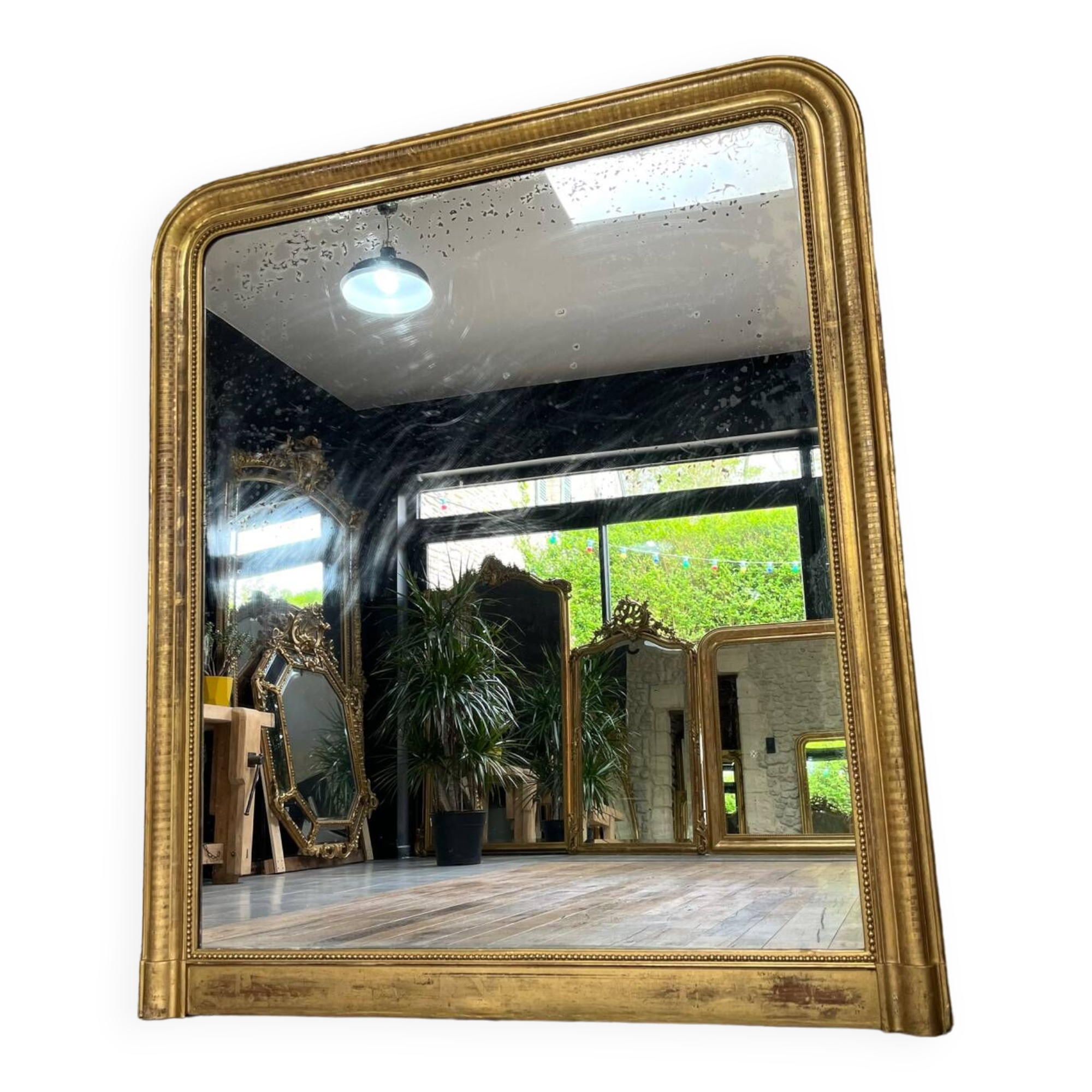 Louis-Philippe mantel mirror 133cm/115.5cm beaded gilded with gold leaf geometric decoration, late 19th century, heavily pitted and scratched glass, parquet on the back.