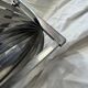 Brushed steel suspension