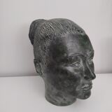 Sculpture face woman in plaster