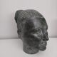 Sculpture face woman in plaster
