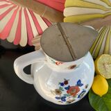 Vintage porcelain jug with lid