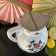 Vintage porcelain jug with lid