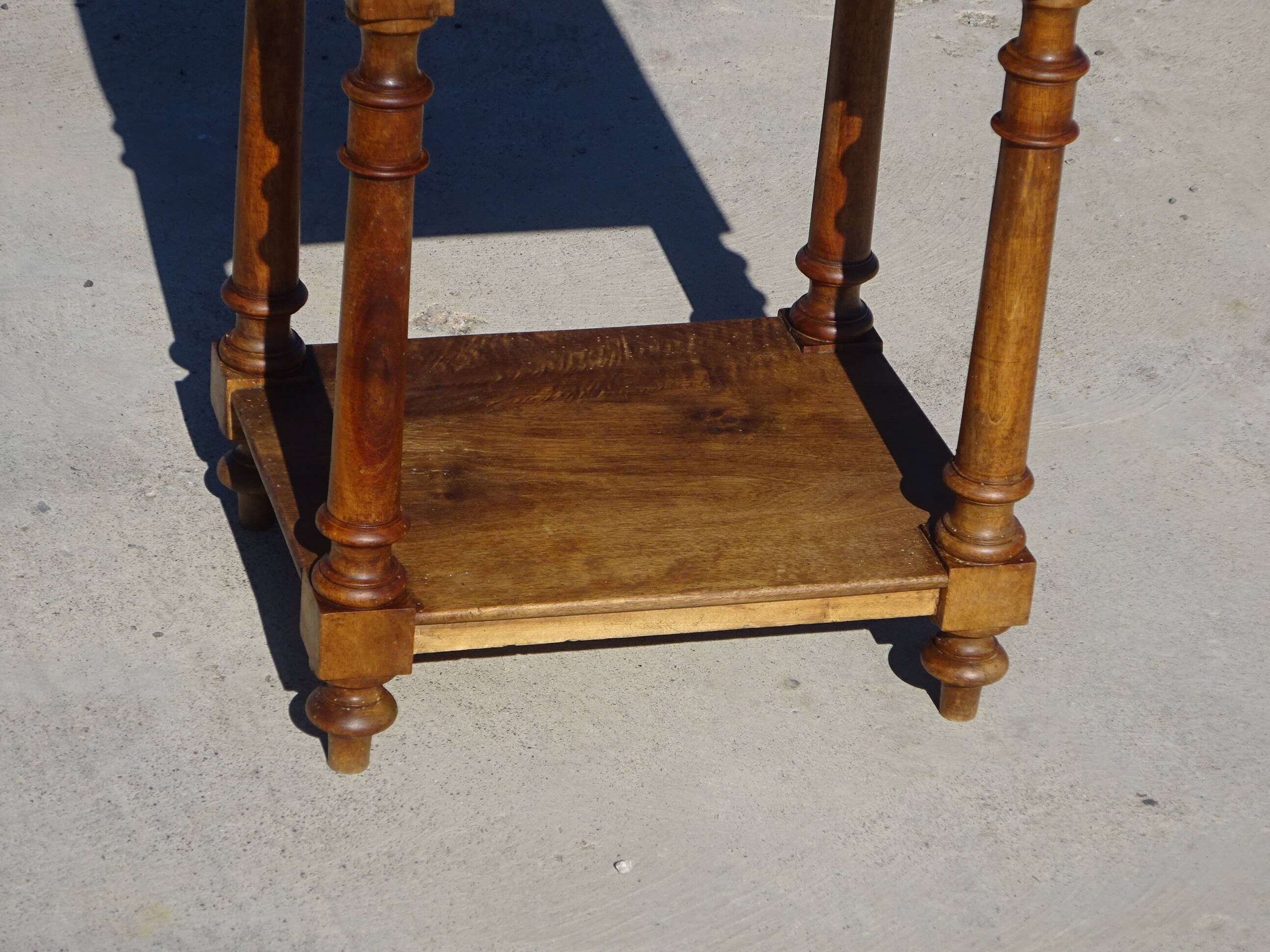 Antique Louis XVI style bedside table in walnut, with a marble top.