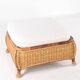 Large wicker armchair and its ottoman