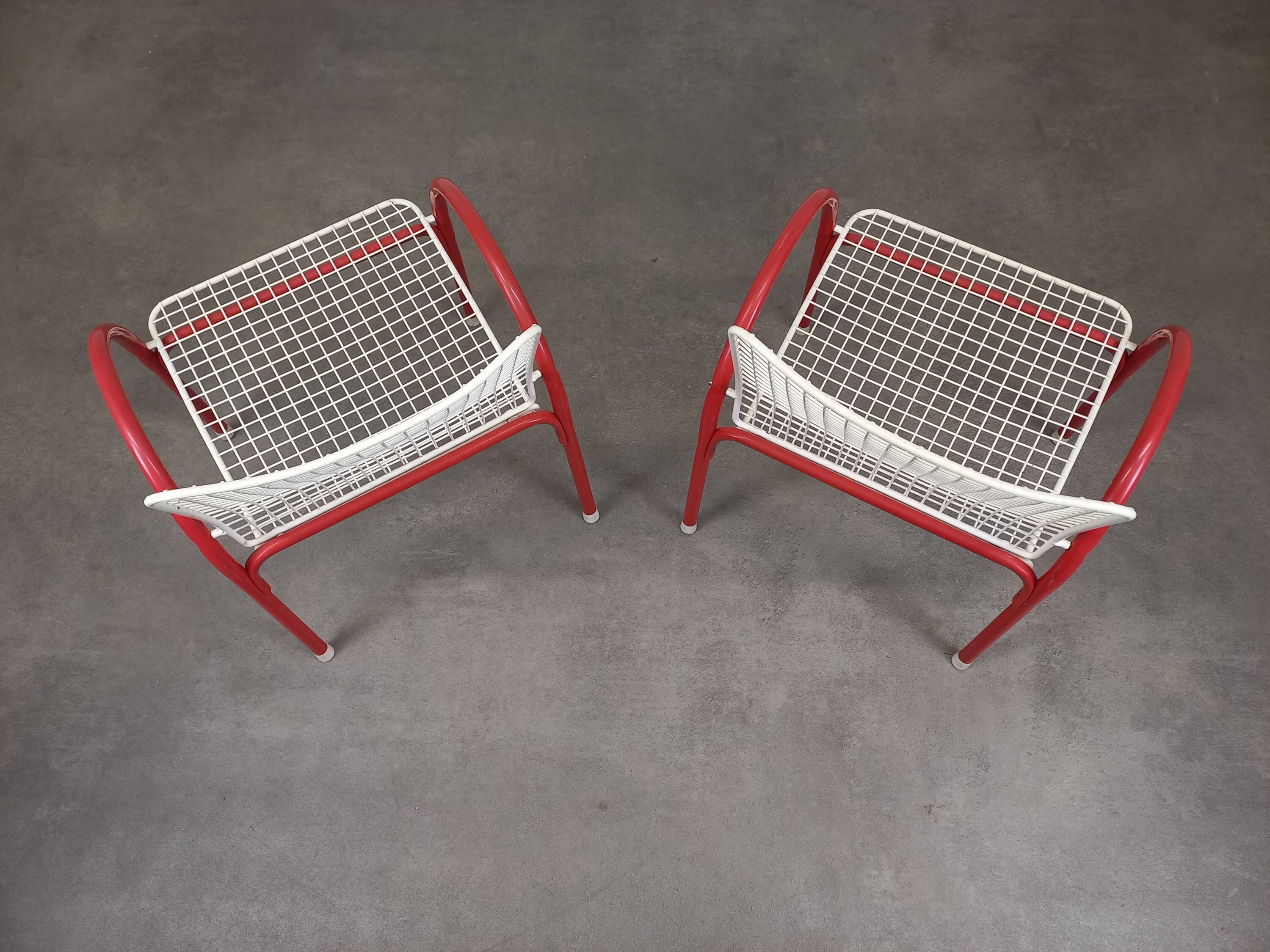 Pair of Emu Rio garden armchairs