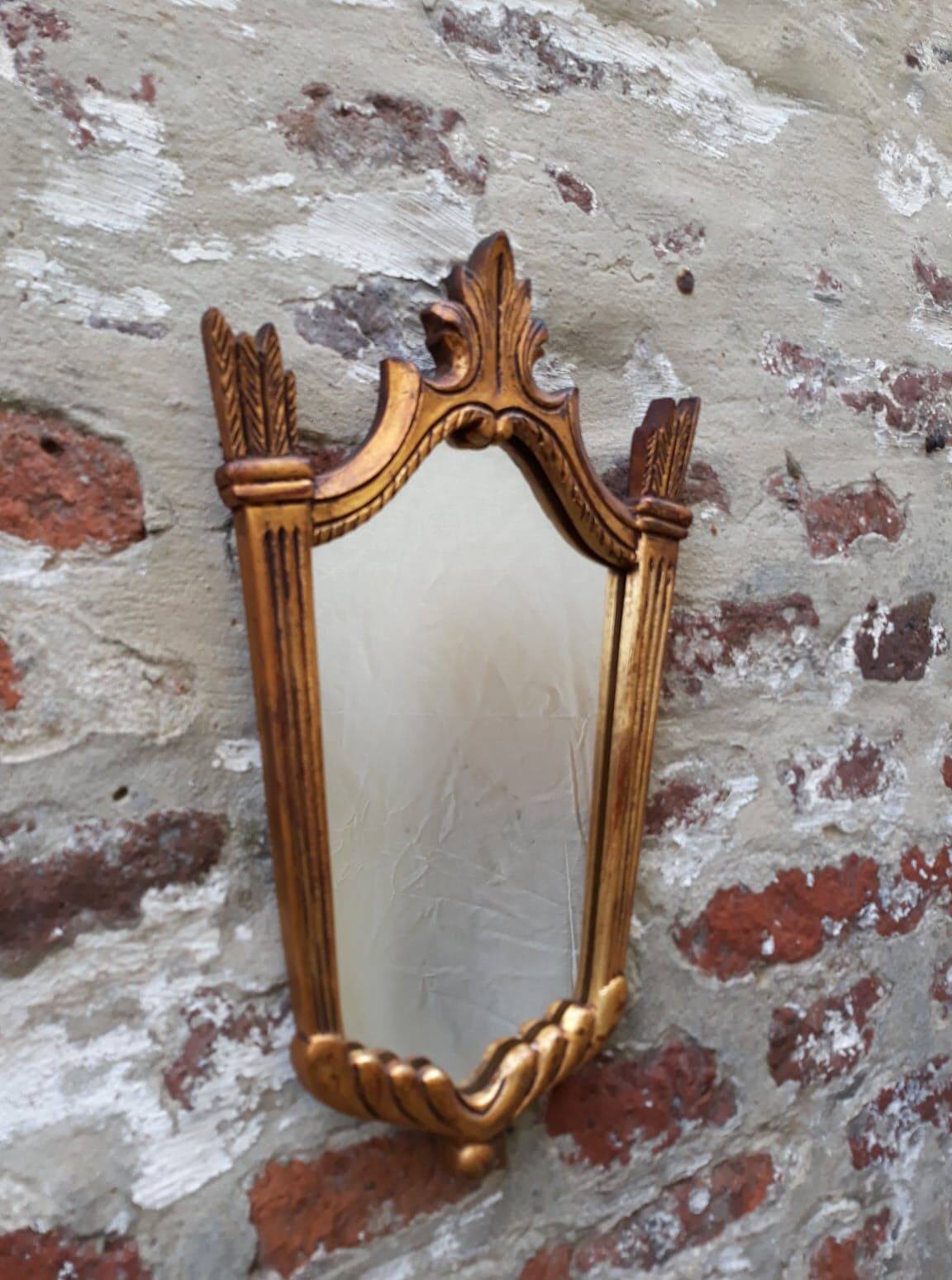 Art Deco mirror in carved wood with gilding, 1950