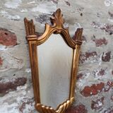 Art Deco mirror in carved wood with gilding, 1950