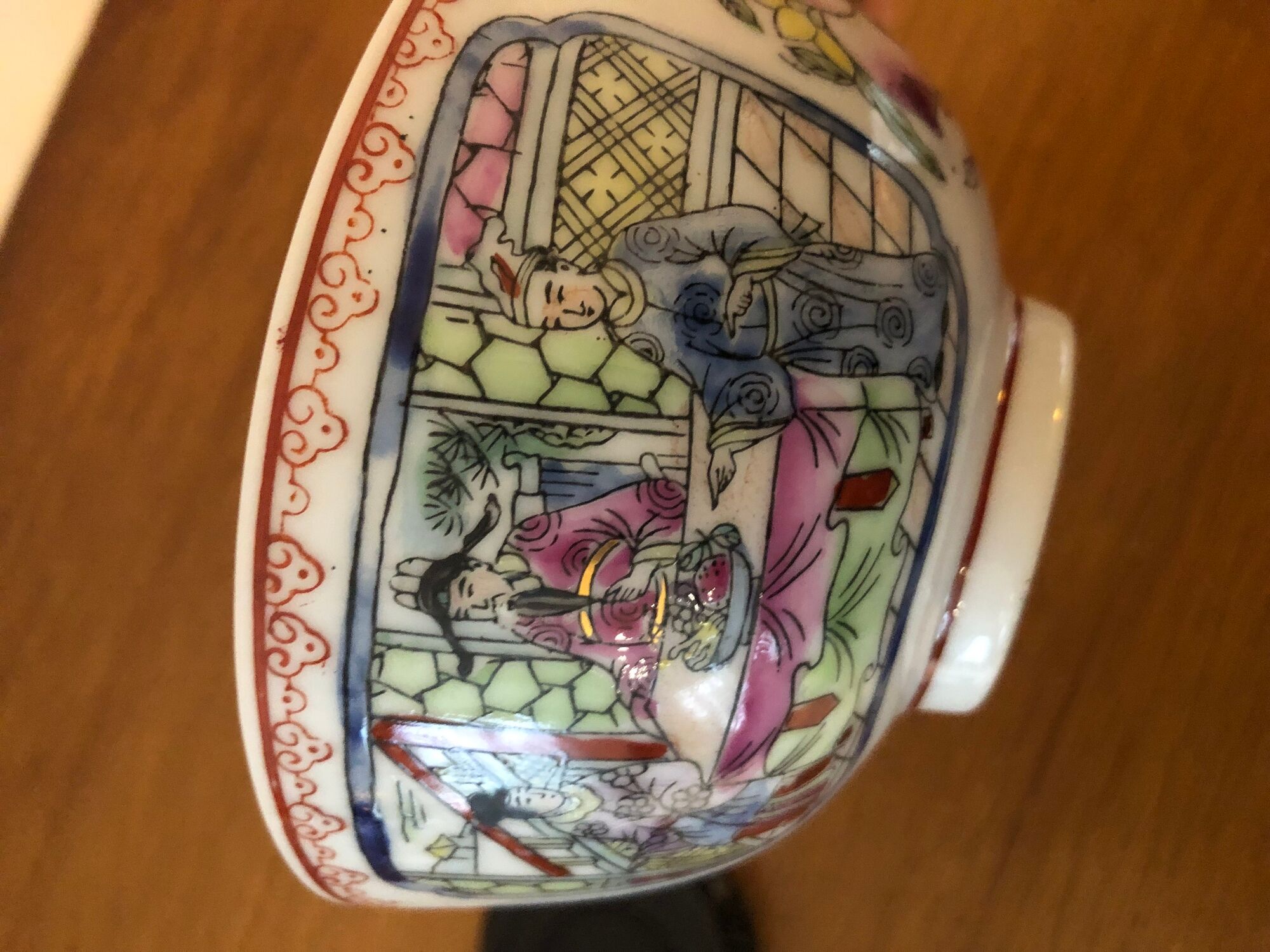 Chinese porcelain bowl on wooden base