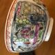 Chinese porcelain bowl on wooden base