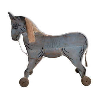 Wooden horse on wheels - folk art
