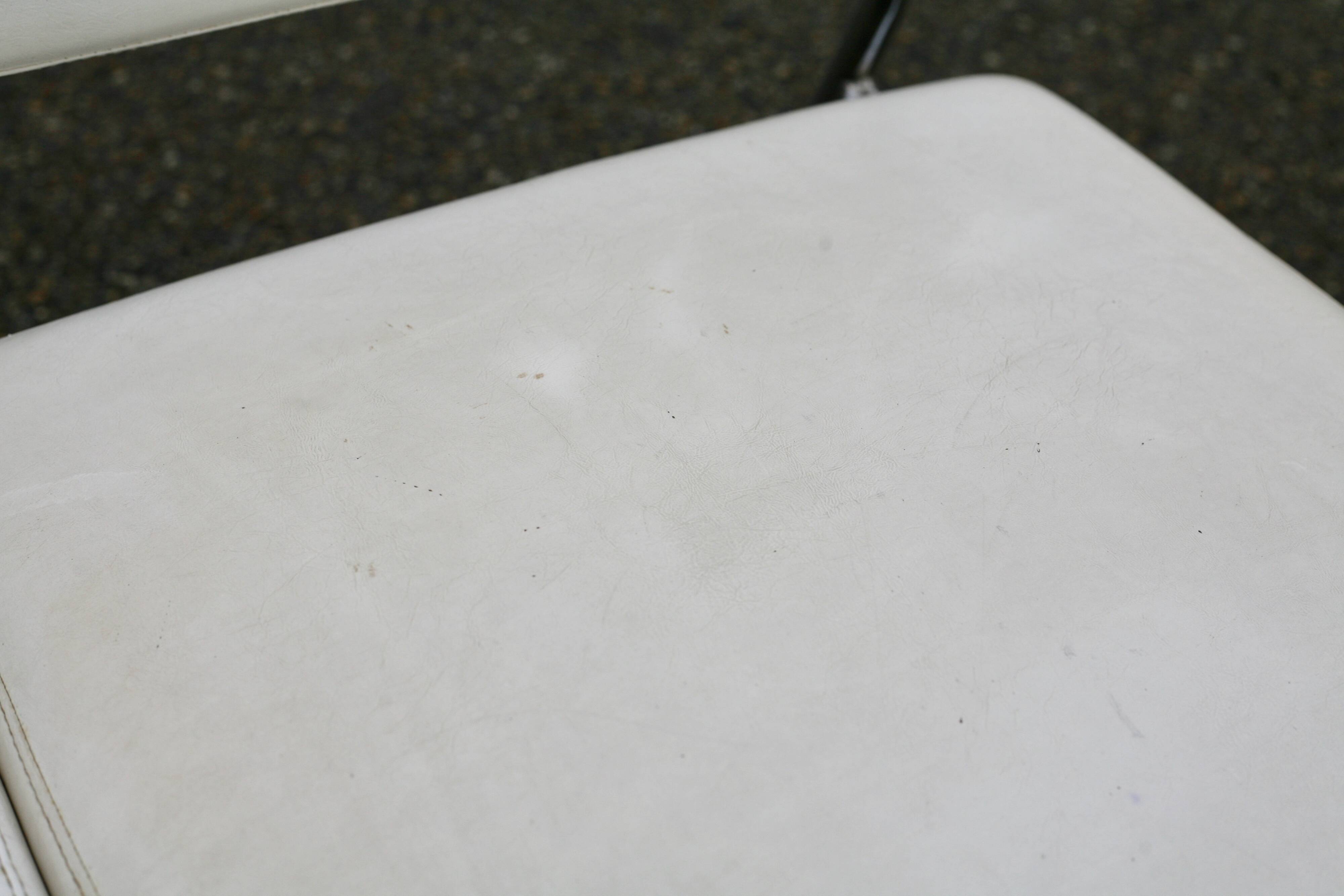 4 armchairs forming a modular sofa. Steel, imitation leather, 70s