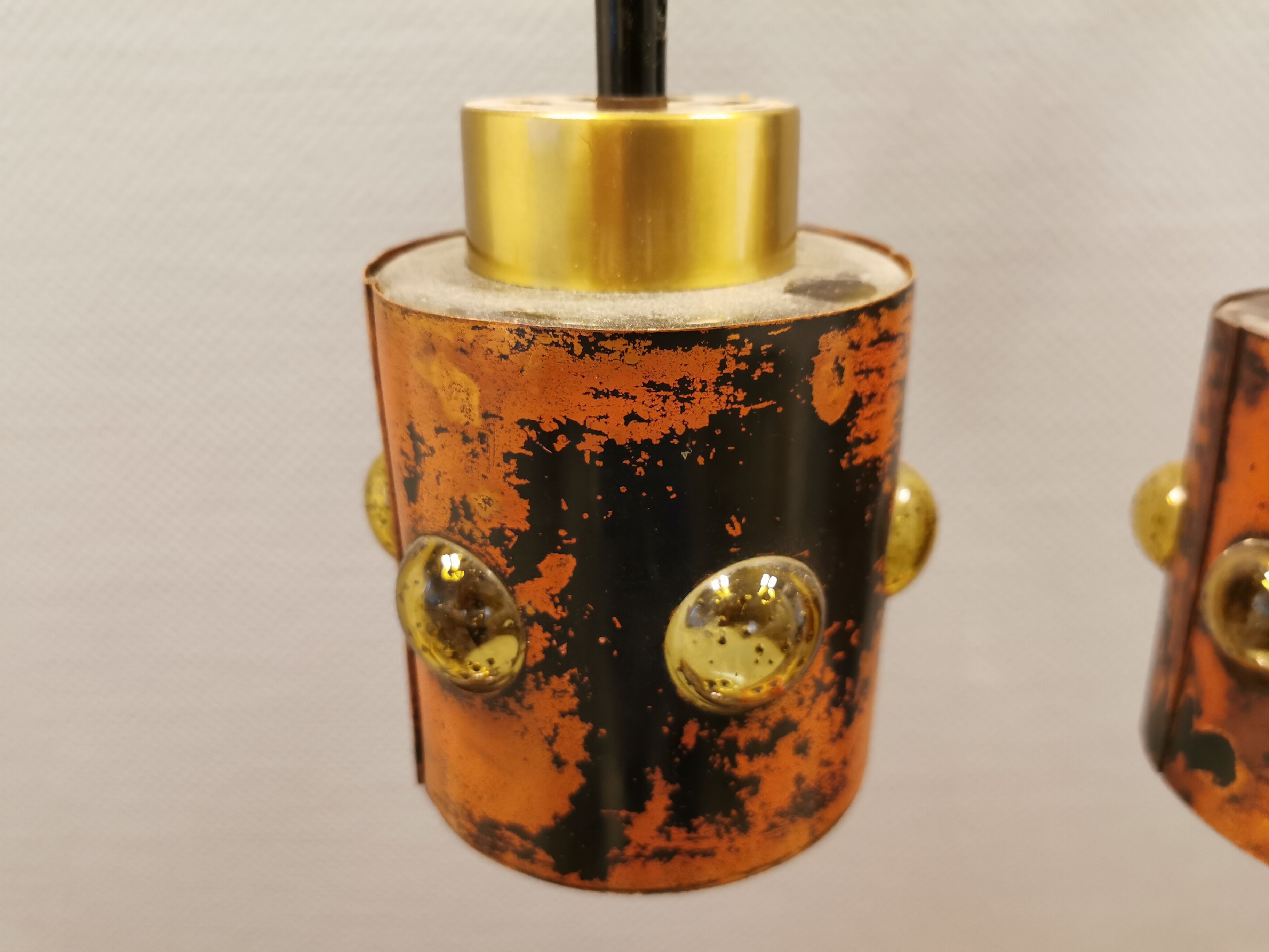 3 lamps made of copper, brass and glass.