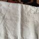 Drap de trousseau monogramme RC vers 1900.