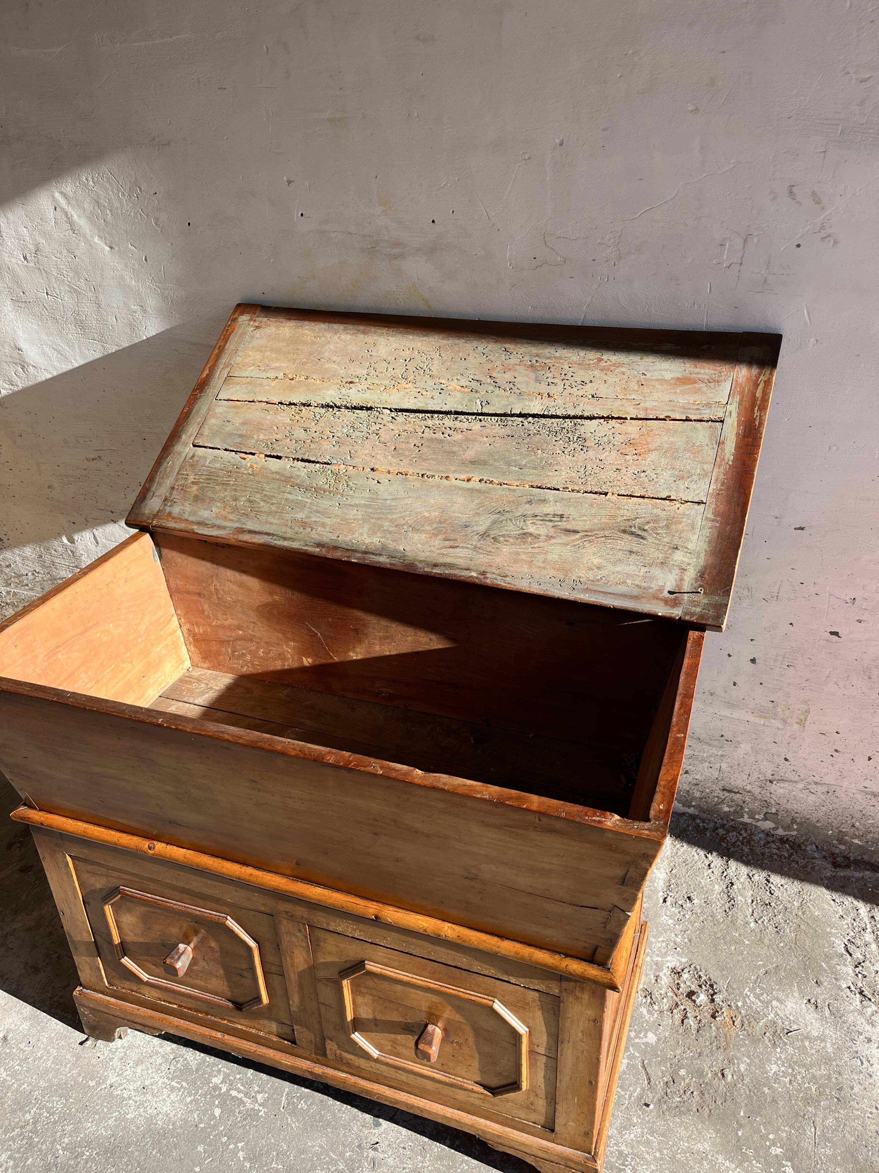 Old wooden baker's chest with storage drawers
