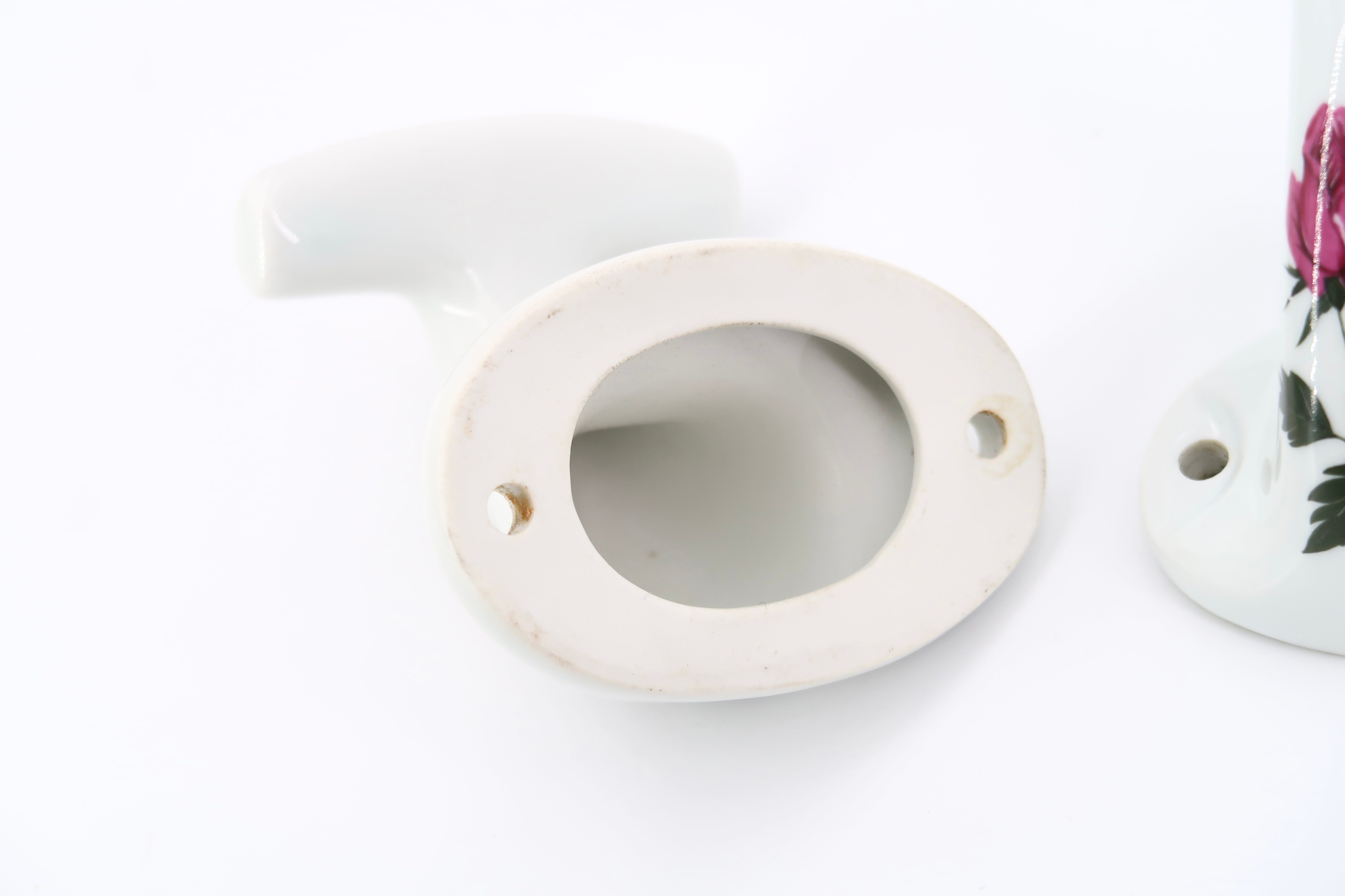Pair of porcelain hooks from Limoges Chapus Frères