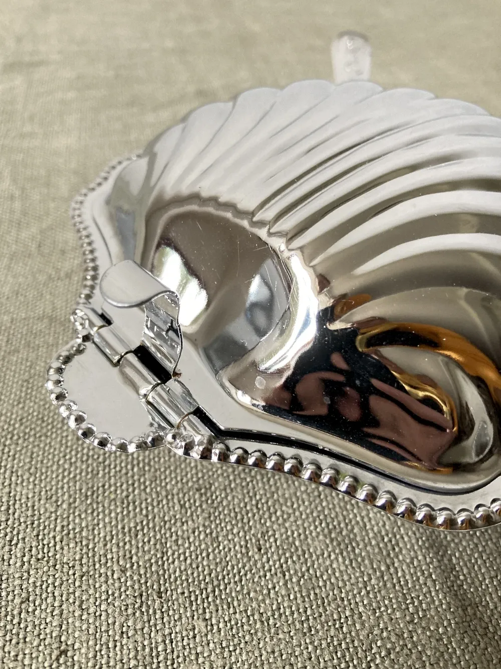 Metal shell butter dish with glass bowl and knife
