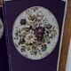 Four-panel screen decorated with an oval tapestry from the 20th century.