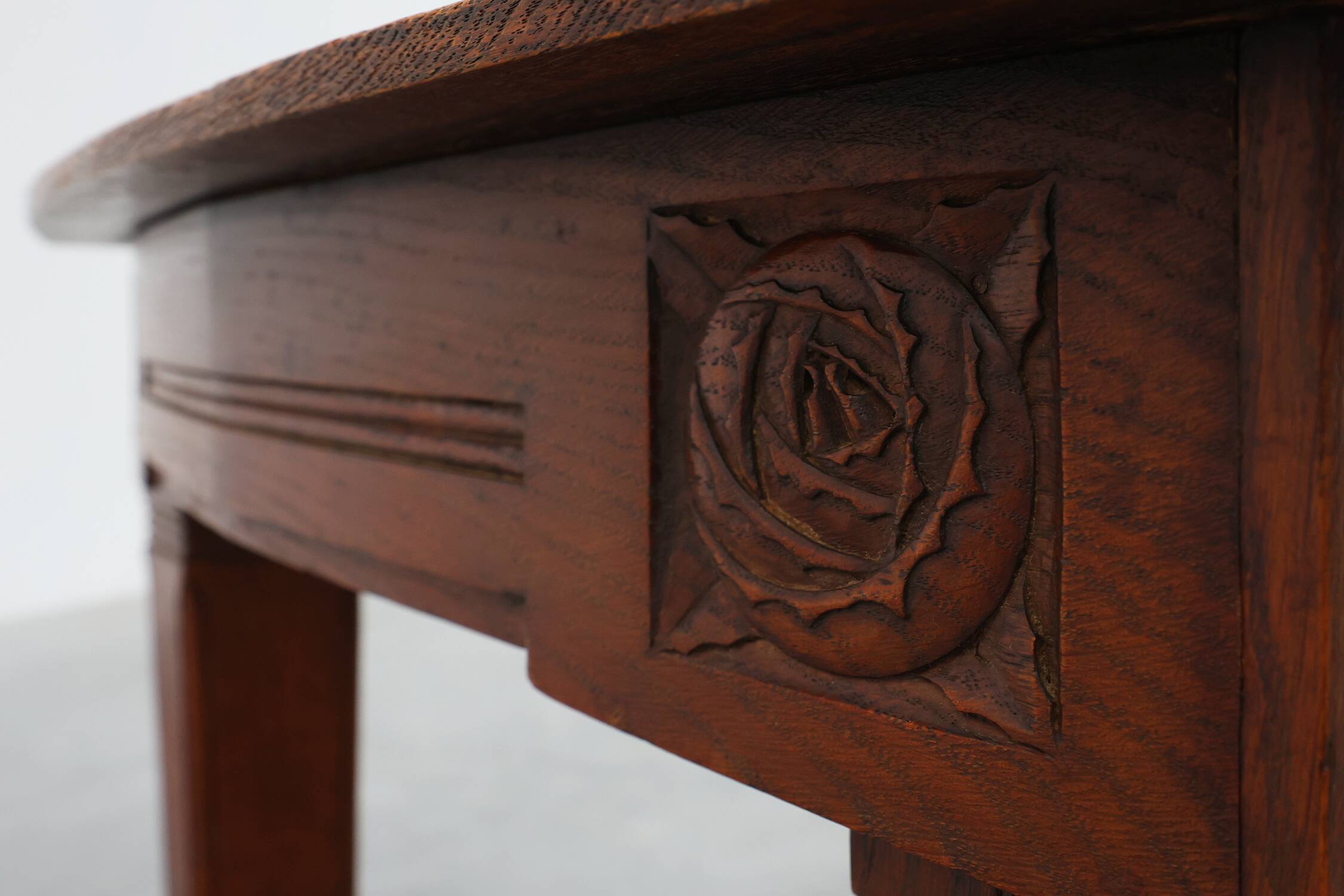 Oak Art Deco dining table with carved frieze, France 1920s