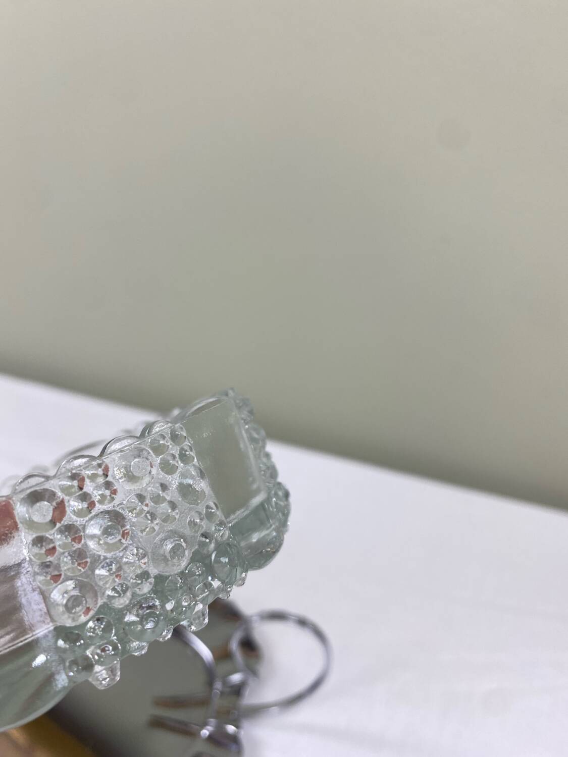 Metal and glass bowl