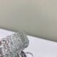 Metal and glass bowl