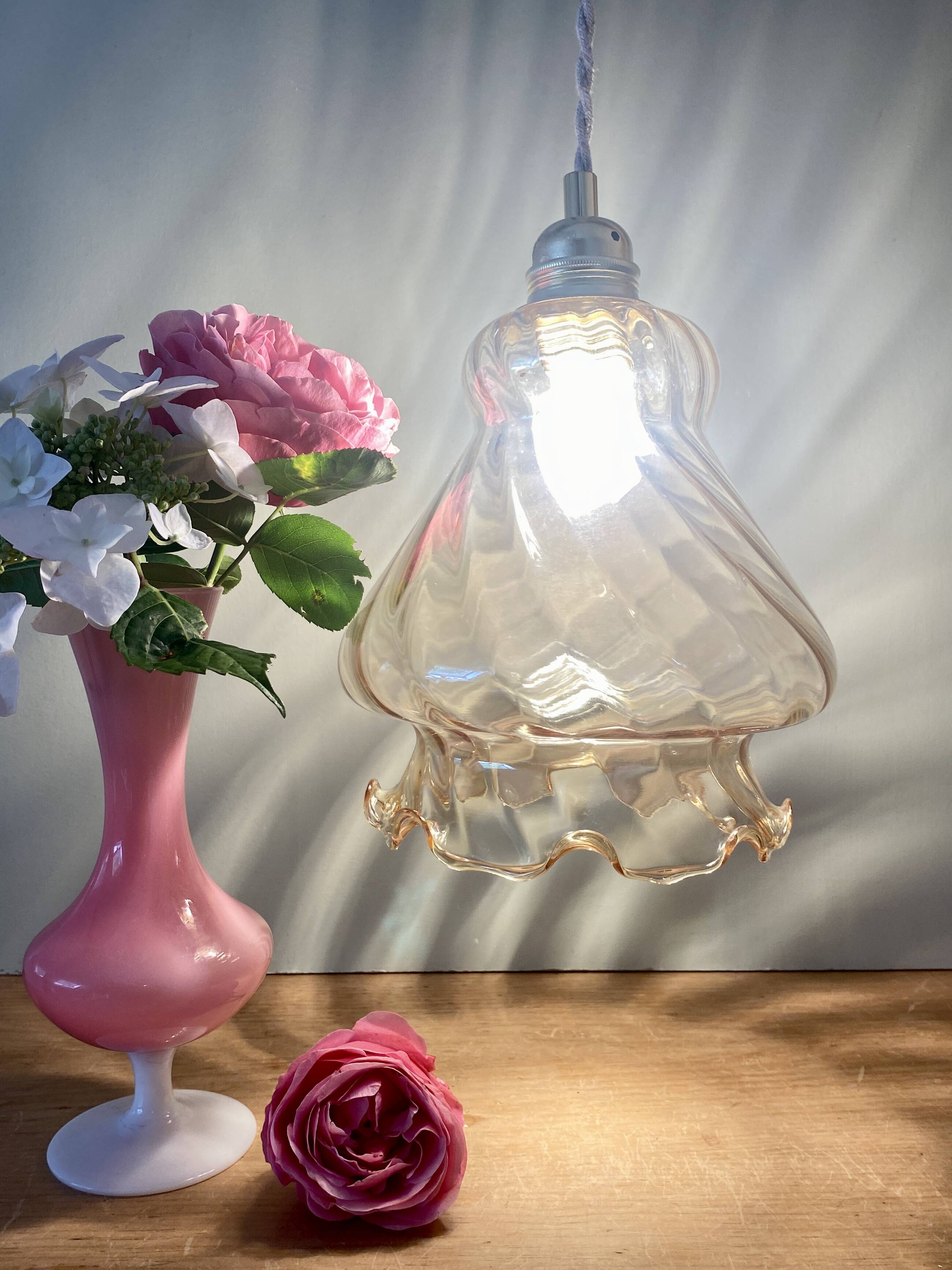 Suspension globe vintage en verre ambré