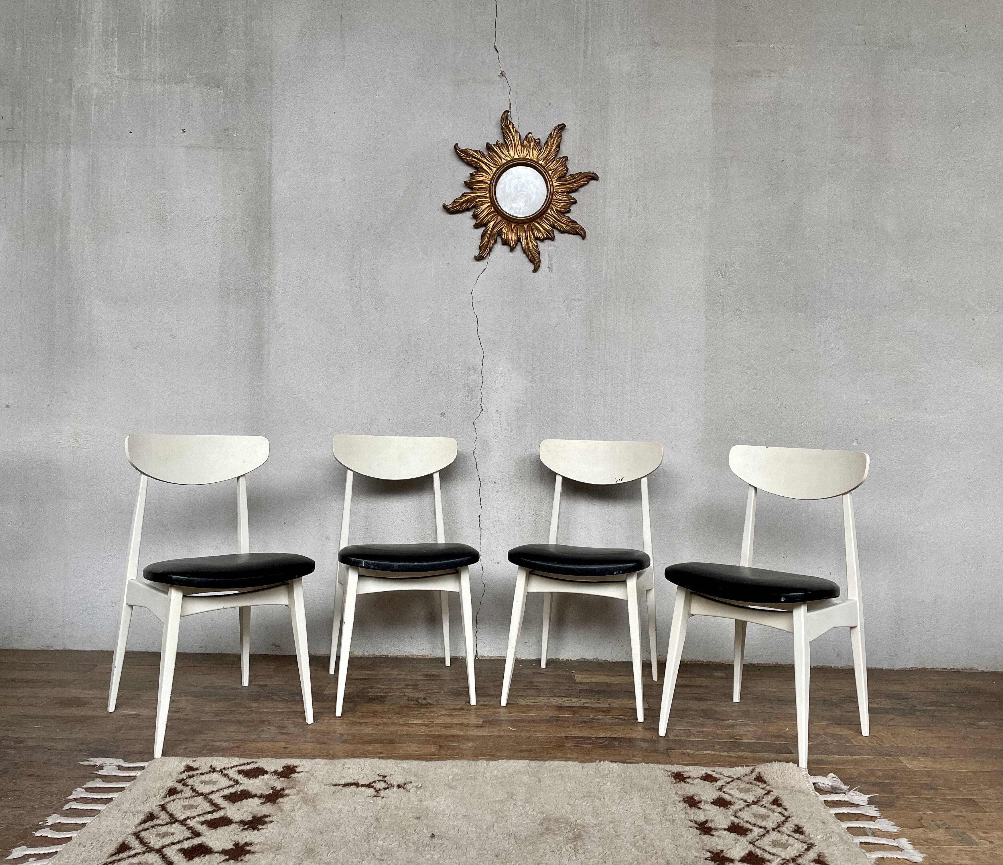 Series of 4 white and black Scandinavian chairs Ingrid from Stella 1960.