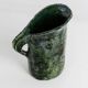 Vintage 1970s studio ceramic vase or pitcher, glazed green.