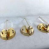 Vintage set of three sconces in brass and glass by Zero Quattro. Italy 1970s