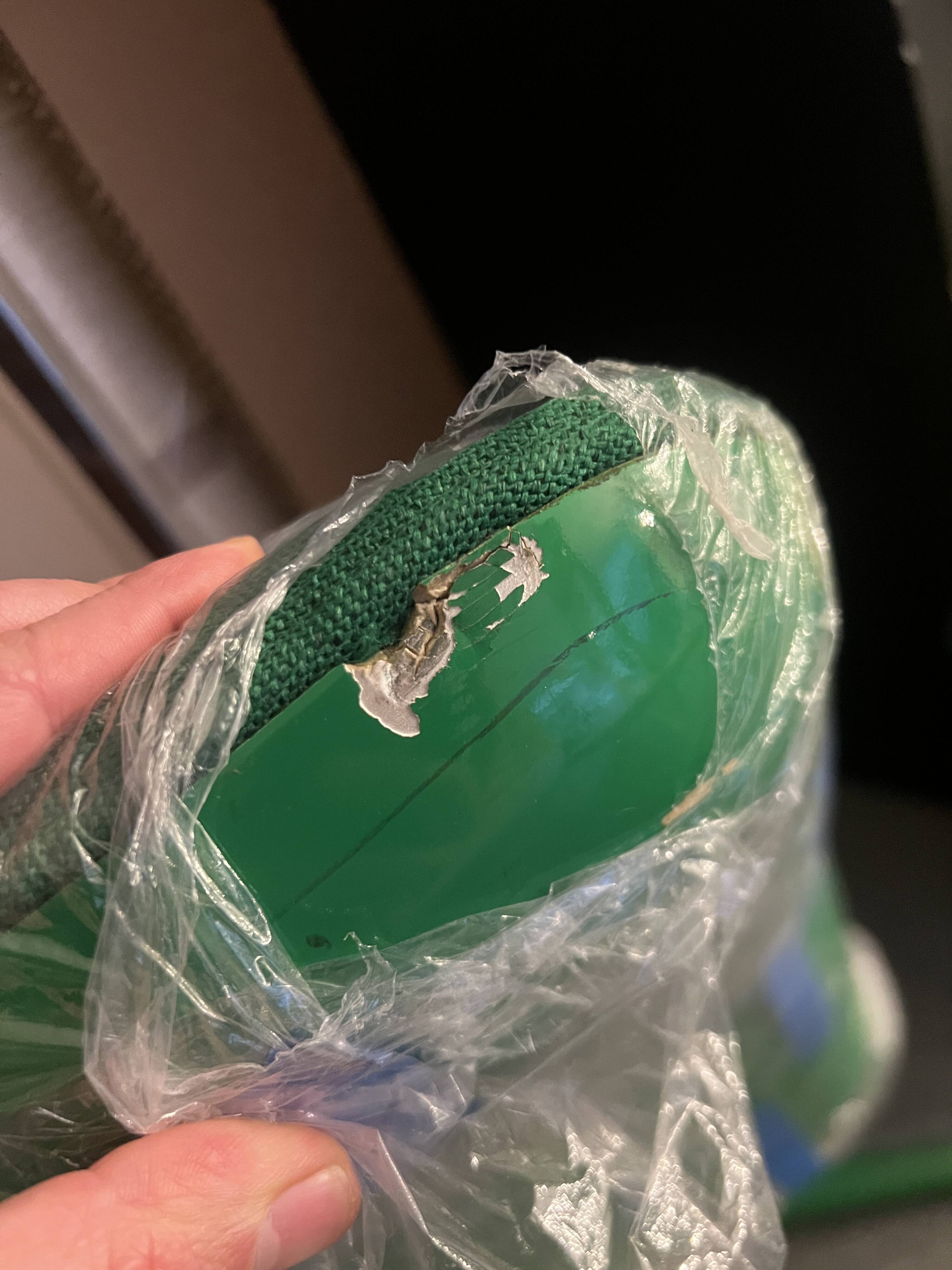 Green Artifort armchair, design by Geoffrey Harcourt.