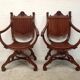 Pair of antique armchairs curules called Dagobert in carved wood