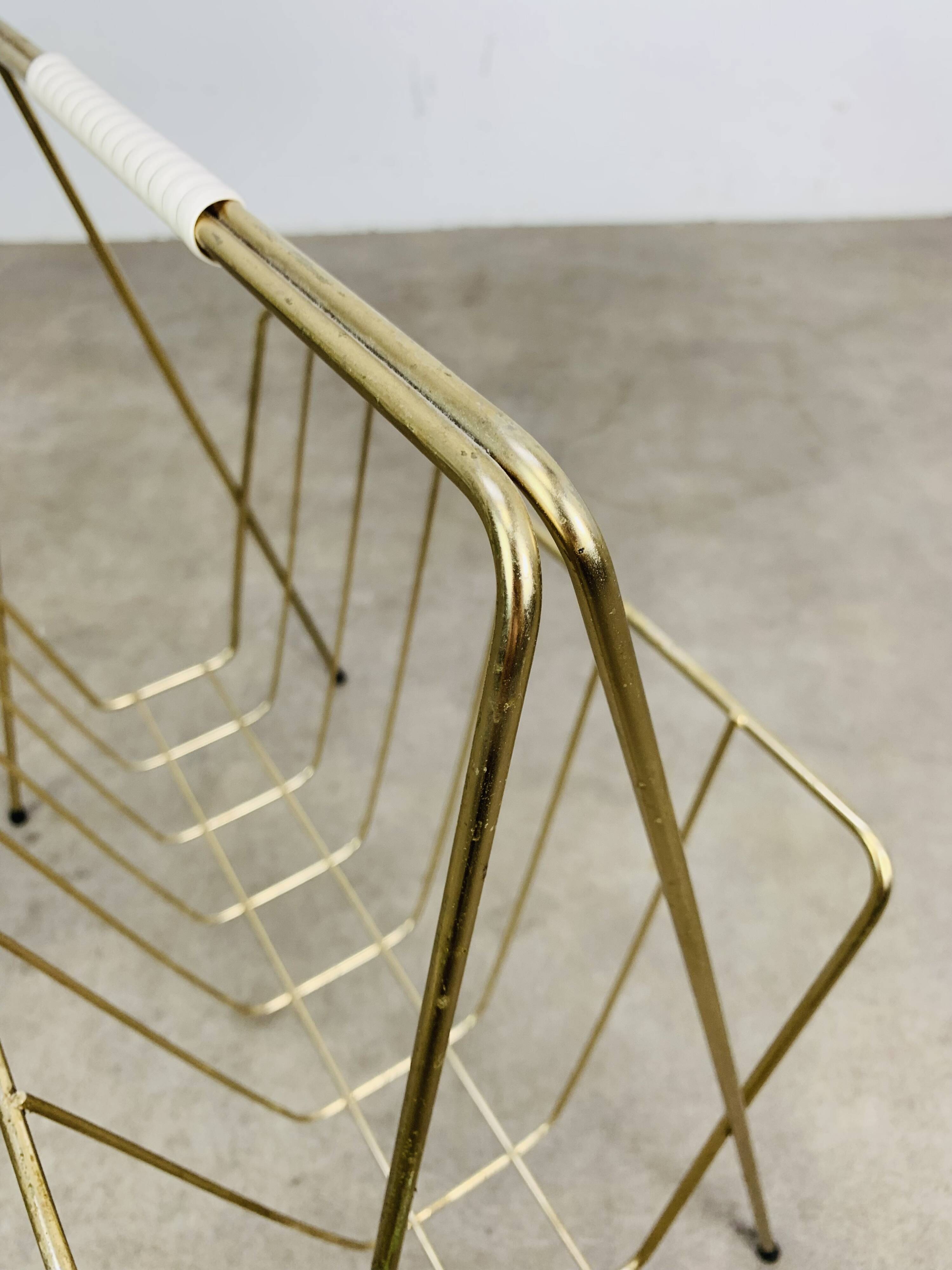 Porte-revue métal doré années 60