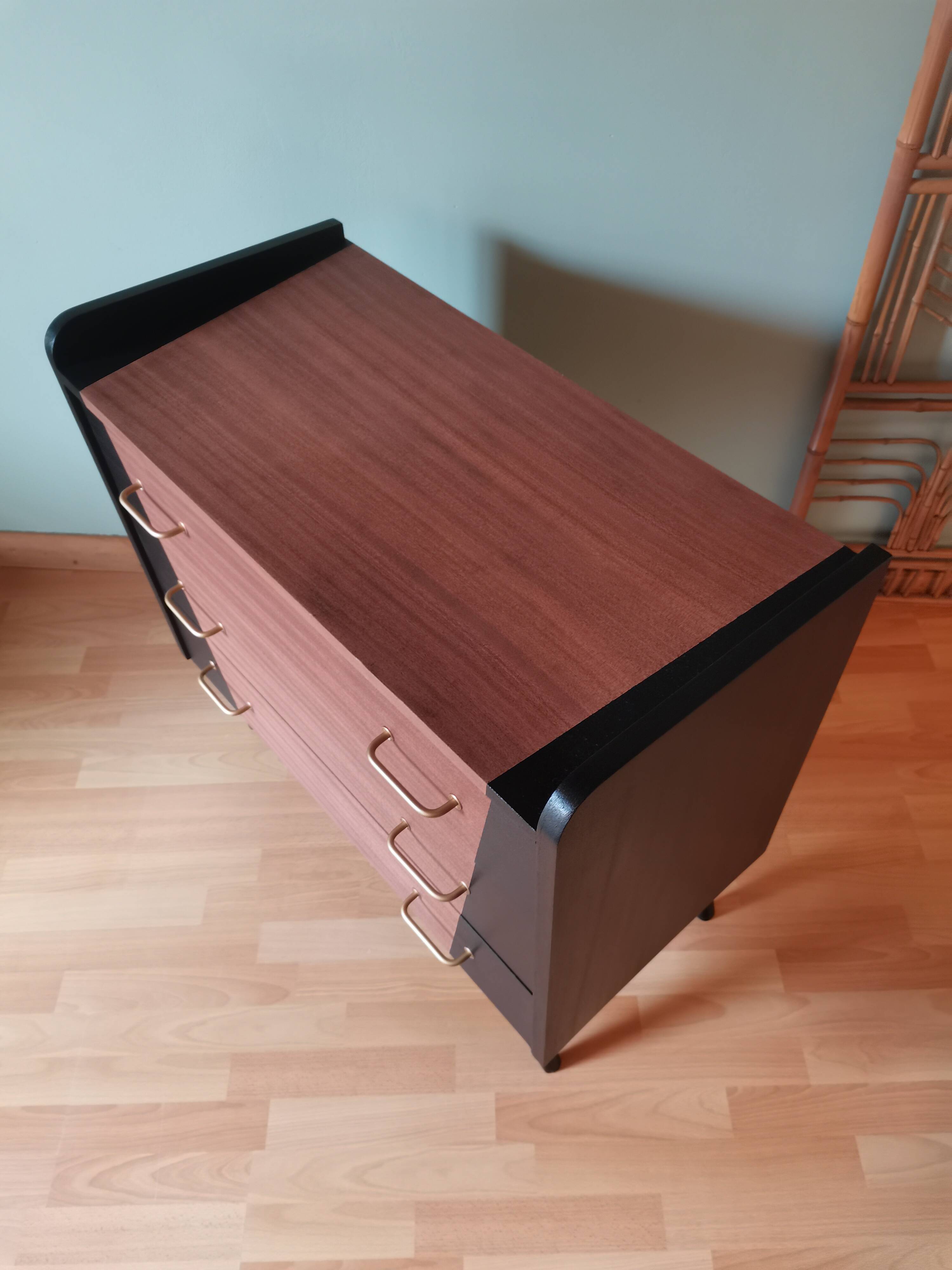 Scandinavian commode with black tapered legs