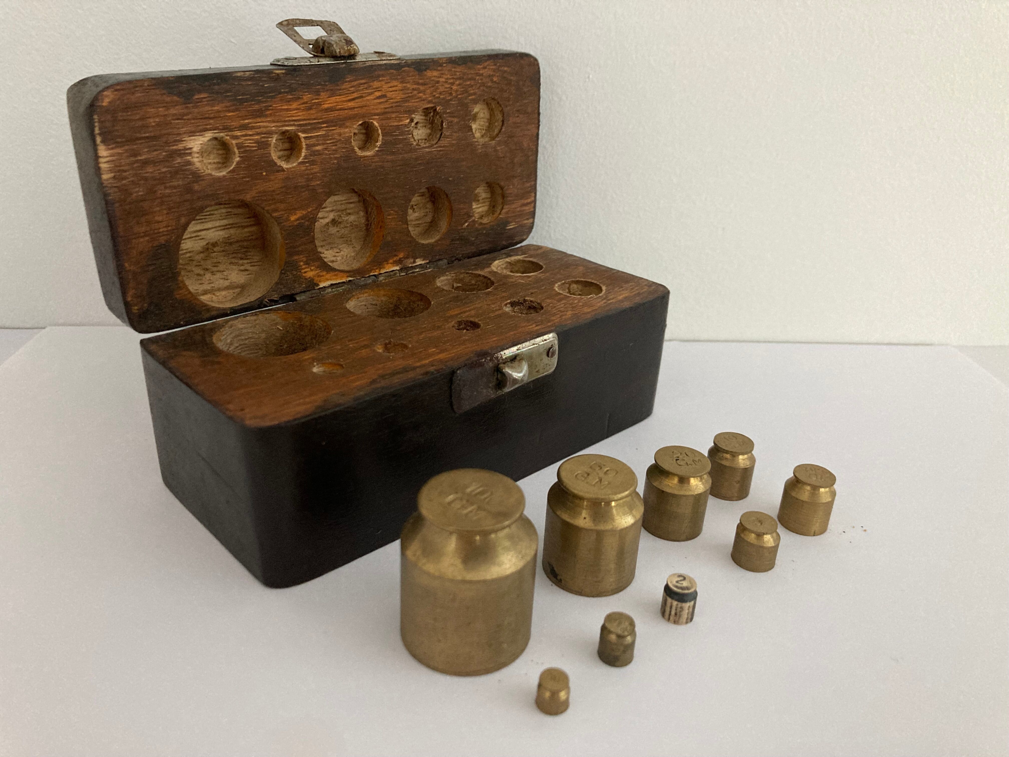 Balance weight in their wooden box