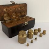 Balance weight in their wooden box