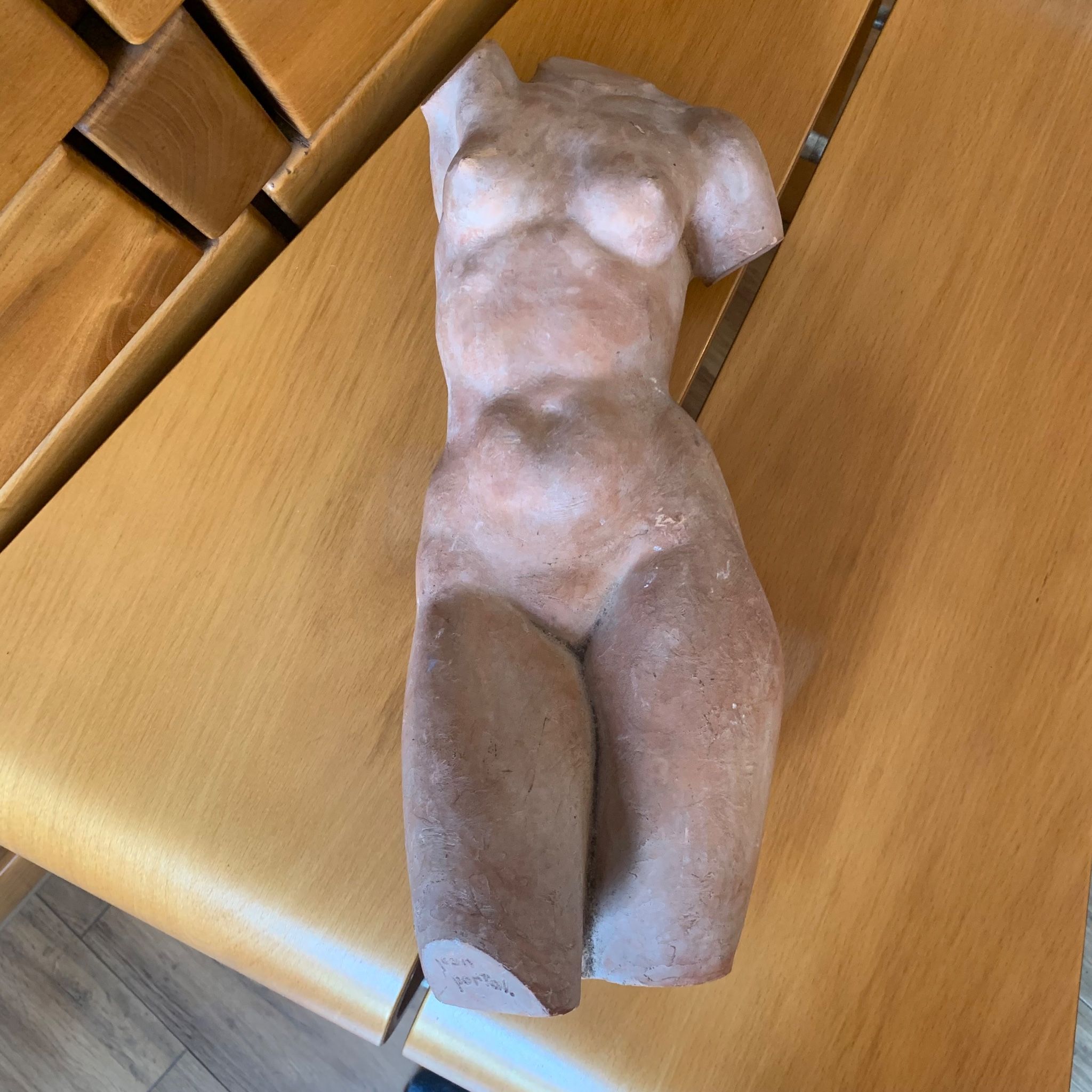Female nude sculpture in terracotta signed Jean Portal.