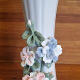 Porcelain vase with flowers in relief