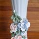 Porcelain vase with flowers in relief