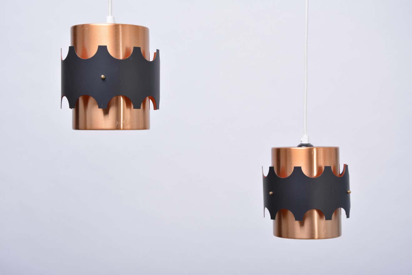 Set of two mid-century copper-colored German pendant lamps