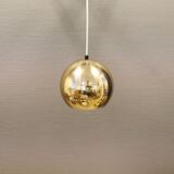 Danish ball lamp from the 80s, in gold colored lacquer.
