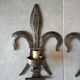 Brutalist iron wall light "fleur de lys"