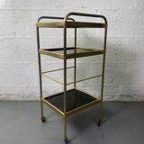 Small rolling trolley in brass and black plastic