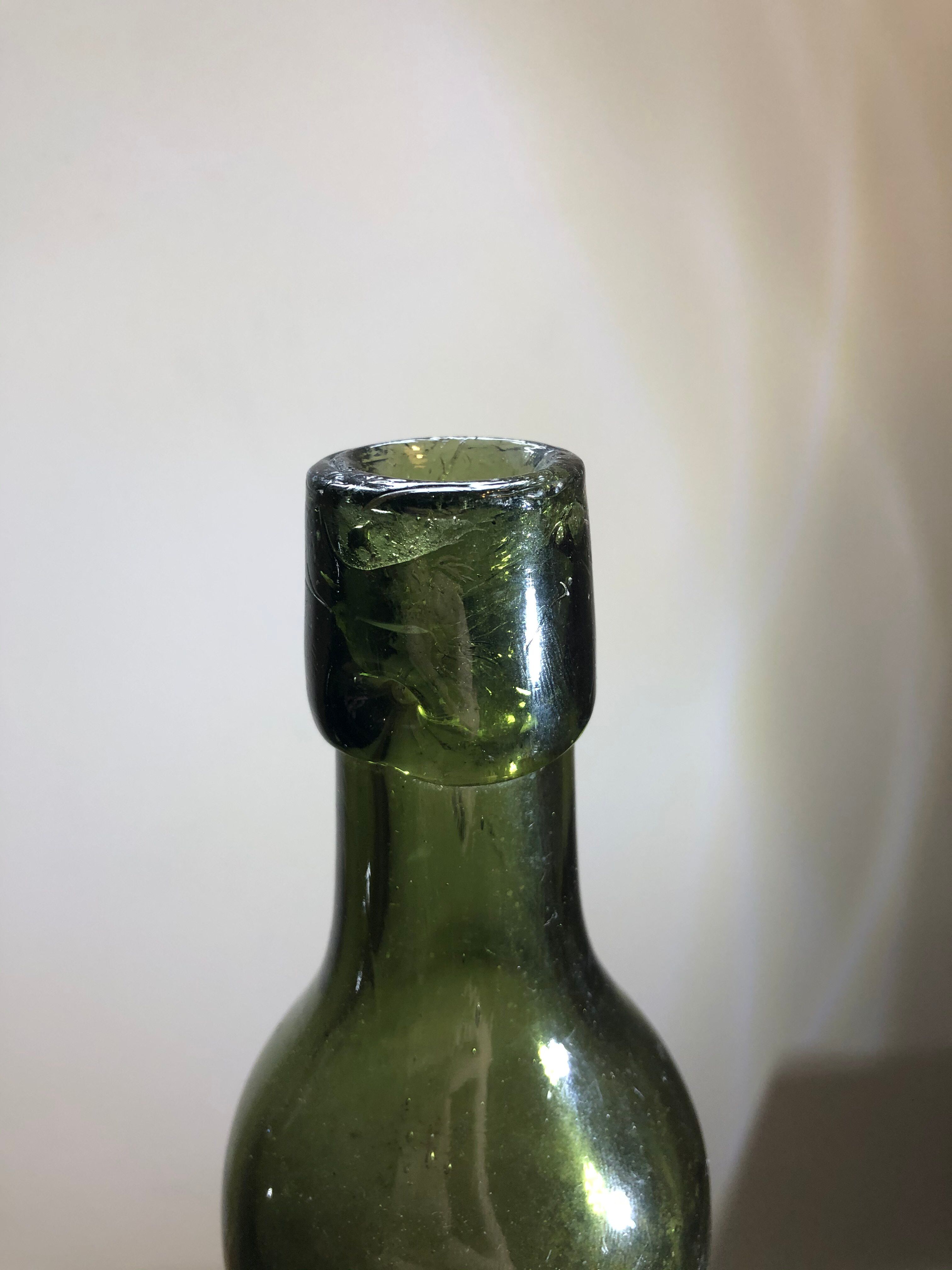 Lot of old blown glass beer bottles with marking