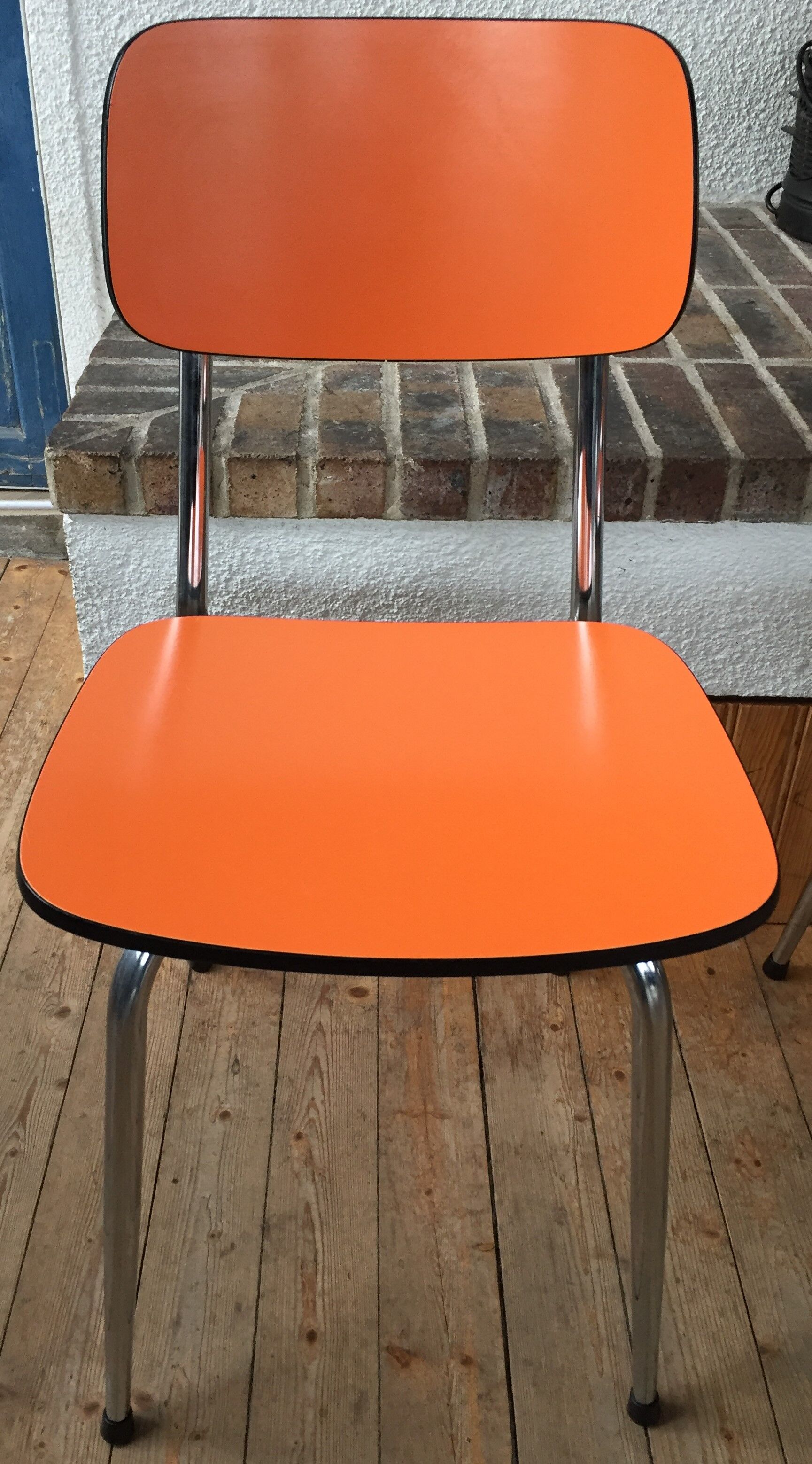 Lot of 4 vintage chairs in orange formica
