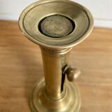 Nineteenth-century brass pull-out candle holder
