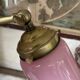Large vintage lamp in brass with a pink opaline shade.